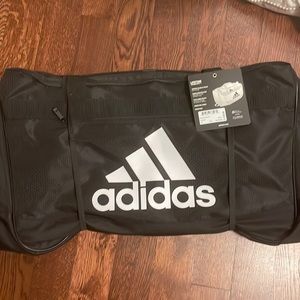 Adidas duffel bag new with tags. Originally $50.